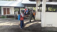 KODIM, Polres dan Pemerintah Kabupaten Karangasem dengan melaksanakan penyemprotan desinfektan secara serentak di delapan kecamatan di wilayah Kabupaten Karangasem, Sabtu (21/3/2020). Foto: nad KODIM, Polres dan Pemerintah Kabupaten Karangasem dengan melaksanakan penyemprotan desinfektan secara serentak di delapan kecamatan di wilayah Kabupaten Karangasem, Sabtu (21/3/2020). Foto: nad