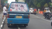 amerta di angkot ARMADA angkot di Denpasar memasang gambar paket Amerta di kaca belakang mereka. Foto: gus hendra