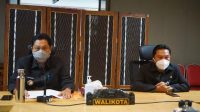 WALI KOTA Denpasar, IB Rai Dharmawijaya Mantra; didampingi Pj. Sekda Kota Denpasar, I Made Toya, saat mengikuti Pembukaan Sidang Paripurna DPRD Denpasar secara virtual, Rabu (18/11/2020). Foto: ist WALI KOTA Denpasar, IB Rai Dharmawijaya Mantra; didampingi Pj. Sekda Kota Denpasar, I Made Toya, saat mengikuti Pembukaan Sidang Paripurna DPRD Denpasar secara virtual, Rabu (18/11/2020). Foto: ist