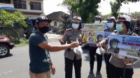 POLWAN Satlantas Polres Jembrana membagikan nasi bungkus saat operasi Zebra Lempuyang. Foto: man POLWAN Satlantas Polres Jembrana membagikan nasi bungkus saat operasi Zebra Lempuyang. Foto: man