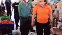 PETUGAS gabungan melakukan sidak penerapan PPKM di sejumlah tempat umum dan pasar di wilayah Kecamatan Denpasar Utara, Minggu (17/1/2021). Foto: ist PETUGAS gabungan melakukan sidak penerapan PPKM di sejumlah tempat umum dan pasar di wilayah Kecamatan Denpasar Utara, Minggu (17/1/2021). Foto: ist