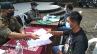 PELANGGAR prokes Covid-19 buat surat pernyataan. Foto: adi PELANGGAR prokes Covid-19 buat surat pernyataan. Foto: adi