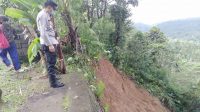 HUJAN deras mengakibatkan tanah longsor dan pohon tumbang terjadi di beberapa tempat di Tabanan, Jumat (15/1/2021). Di antaranya terjadi di Banjar Dinas Munduk Gawang, Desa Belatungan, Kecamatan Pupuan. Foto: ist HUJAN deras mengakibatkan tanah longsor dan pohon tumbang terjadi di beberapa tempat di Tabanan, Jumat (15/1/2021). Di antaranya terjadi di Banjar Dinas Munduk Gawang, Desa Belatungan, Kecamatan Pupuan. Foto: ist