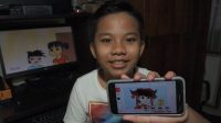 PUTU Akalanka Putra Karnaedi saat memperlihatkan animasi hasil karyanya. Foto: ist PUTU Akalanka Putra Karnaedi saat memperlihatkan animasi hasil karyanya. Foto: ist