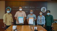 PENANDATANGANAN perjanjian kerja sama antara DPMPTSP Kota Denpasar bersama PT Pos Cabang Denpasar di Graha Sewaka Dharma, Senin (1/2/2021). Foto: ist PENANDATANGANAN perjanjian kerja sama antara DPMPTSP Kota Denpasar bersama PT Pos Cabang Denpasar di Graha Sewaka Dharma, Senin (1/2/2021). Foto: ist