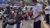 02520 Denpasar Bagikan masker