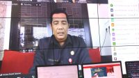BUPATI Tabanan I Komang Gede Sanjaya saat mengikuti Rapat Paripurna DPRD Tabanan, yang dilaksanakan secara virtual, Jumat (12/3/2021). Foto: gap BUPATI Tabanan I Komang Gede Sanjaya saat mengikuti Rapat Paripurna DPRD Tabanan, yang dilaksanakan secara virtual, Jumat (12/3/2021). Foto: gap