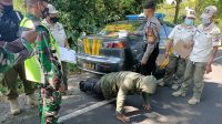 TIM Yustisi melalukan operasi penertiban protokol kesehatan (prokes) bagi pengunjung di kawasan Penelokan, Kintamani, Minggu (16/5/2021). Foto: ist TIM Yustisi melalukan operasi penertiban protokol kesehatan (prokes) bagi pengunjung di kawasan Penelokan, Kintamani, Minggu (16/5/2021). Foto: ist