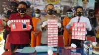 KAPOLRES Gianyar, AKBP I Made Bayu Sutha Sartana; didampingi Kasat Reserse Narkoba AKP I Ketut Merta dan Kasubag Humas AKP I Nyoman Hendrajaya menunjukan barang bukti yang berhasil disita. Foto: adi KAPOLRES Gianyar, AKBP I Made Bayu Sutha Sartana; didampingi Kasat Reserse Narkoba AKP I Ketut Merta dan Kasubag Humas AKP I Nyoman Hendrajaya menunjukan barang bukti yang berhasil disita. Foto: adi