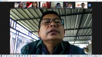 KETUT Rudia saat mengikuti rapat virtual membahas penyusunan buku panduan E-Book JDIH Bawaslu, Selasa (27/7/2021). Foto: ist KETUT Rudia saat mengikuti rapat virtual membahas penyusunan buku panduan E-Book JDIH Bawaslu, Selasa (27/7/2021). Foto: ist
