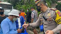 PEMBAGIAN sembako kepada warga terdampak PPKM dan Covid-19, yang digelar Polres Tabanan