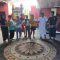 PENYERAHAN beras kepada perwakilan masyarakat di Kelurahan Kapal oleh Ketua Yayasan Bima Sakti, Ida Bagus Surya Miasa (kedua dari kanan). Foto: ist