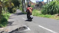 JALAN BERLUBANG