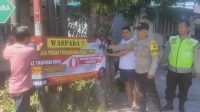 MEWASPADAI TPPO, Polsek Blahbatuh memasang spanduk imbauan tentang pemberantasan Tindak Pidana Perdagangan Orang. Foto: adi MEWASPADAI TPPO, Polsek Blahbatuh memasang spanduk imbauan tentang pemberantasan Tindak Pidana Perdagangan Orang. Foto: adi