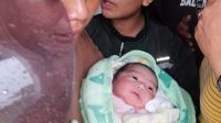 WARGA Banjar Dinas Waringin, Desa Pempatan, Kecamatan Rendang, Kabupaten Karangasem mendadak ramai dengan adanya penemuan bayi perempuan di garasi mobil salah satu warga setempat, Senin (4/3/2024) sekitar pukul 14.30 Wita. Foto: ist WARGA Banjar Dinas Waringin, Desa Pempatan, Kecamatan Rendang, Kabupaten Karangasem mendadak ramai dengan adanya penemuan bayi perempuan di garasi mobil salah satu warga setempat, Senin (4/3/2024) sekitar pukul 14.30 Wita. Foto: ist
