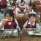 SISWA SD di Denpasar saat menikmati Makan Bergizi Gratis. Foto: ist