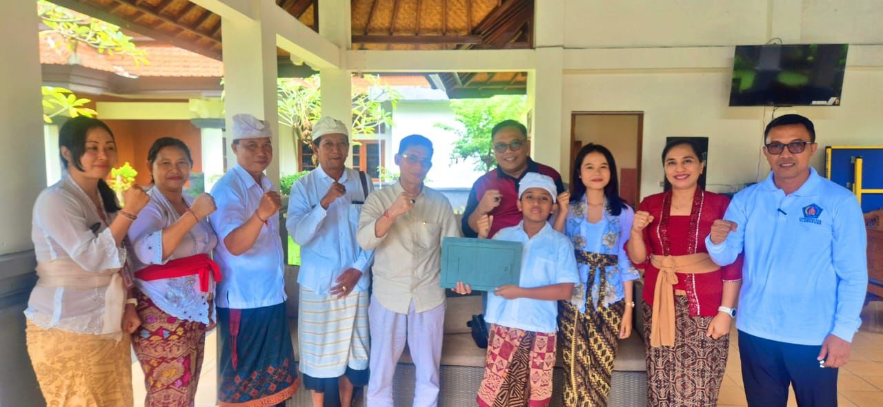 I Komang Randy Satya, siswa SDN 1 Semarapura Tengah, mendapat suntikan motivasi dari Bupati Satria. Foto: ist