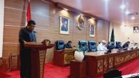 IDA Bagus Santosa yang membacakan pandangan Fraksi Golkar. Foto: ist IDA Bagus Santosa yang membacakan pandangan Fraksi Golkar. Foto: ist