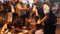 BUPATI KARANGASEM BUPATI Karangasem, I Gusti Putu Parwata, menghadiri gelaran Karangasem Akhir Pekan (KAP) yang dirangkaikan dengan peringatan hari suci Tumpek Krulut di Jalur II Jalan Veteran, Amlapura, Sabtu (1/8/2026) malam. Foto: ist